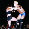 ODB uses a very effective kneelift with a male opponent.