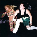 Mickie's right to Haze's jaw sends the blonde flying!