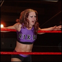 Nikki Roxx hurting in the ropes.
