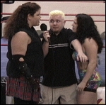It started as a pleasant interview with Little Jeanne...but when Kiley crashed the party, ring announcer Kevin Kage found himself caught between two very angry G.L.O.R.Y. Girls!