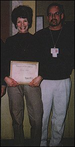 Long retired from the ring, Lola looks as good as ever as she accepts and award from her employer in 2000. Long retired from the ring, Lola looks as good as ever as she accepts and award from her employer in 2000.