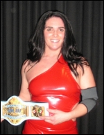 Ms. Natural poses with her WLW Championship Belt.