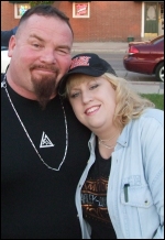 AmyLee snuggles with her BFF Jim Neidhart.