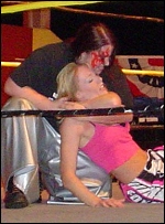 Destruction puts the forearm to Amber O'Neal's pretty throat.