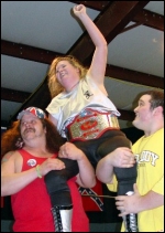 GeeStar is held aloft by her teammates after becoming the first woman ever to win the Mid-Atlantic TV Title.