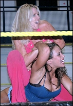 Hall seems to be having a wonderful time as she tortures Alexis Laree (a.k.a. Mickie James). [Photo: Fixated: Jillian Hall]